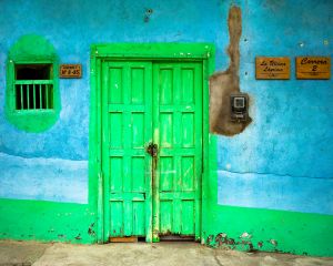 Green door blue wall Colombia