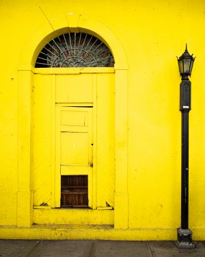 Yellow door with lamppost